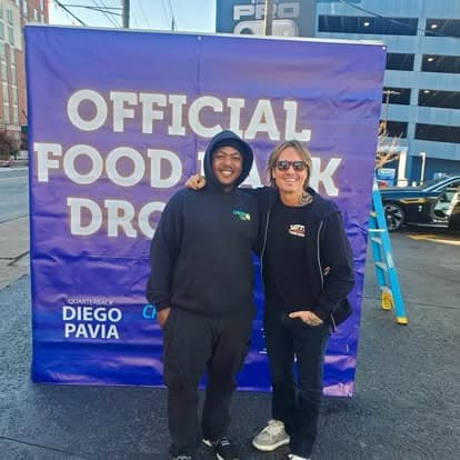 Cheetah Clean team members at a community food drive