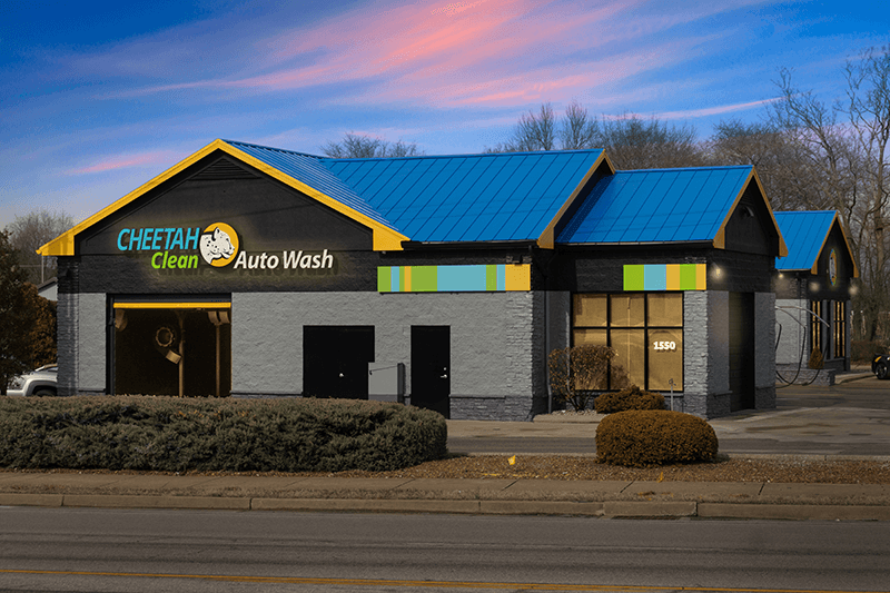 A finished Cheetah Clean Auto Wash location lit up at dusk