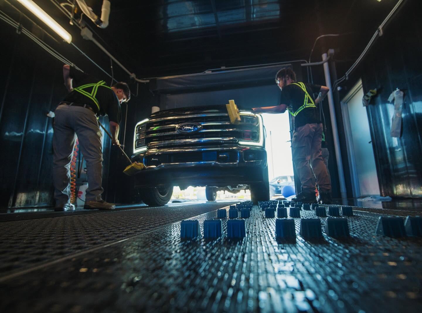 A Cheetah Clean crew prepping a work truck at the tunnel entrance